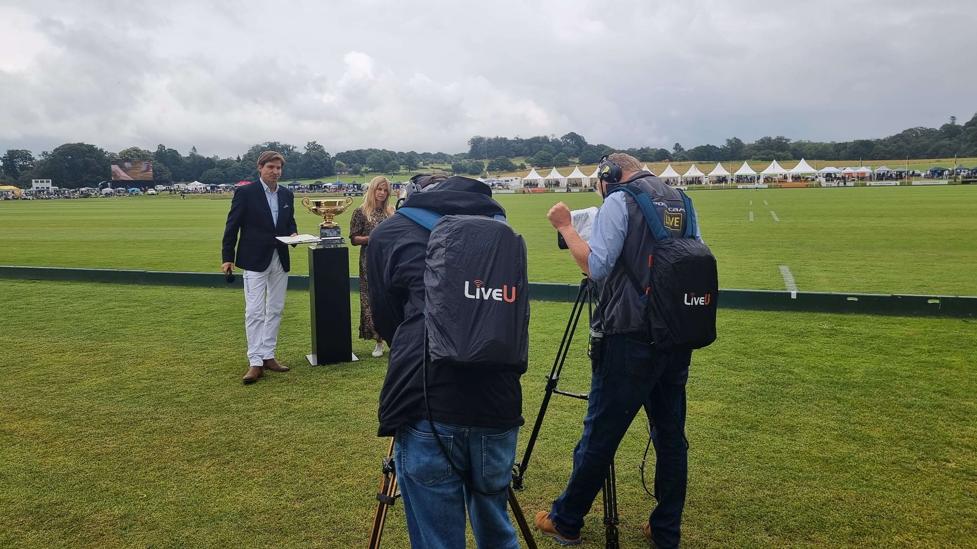 Filming an interview at Cartier Queen's Cup field